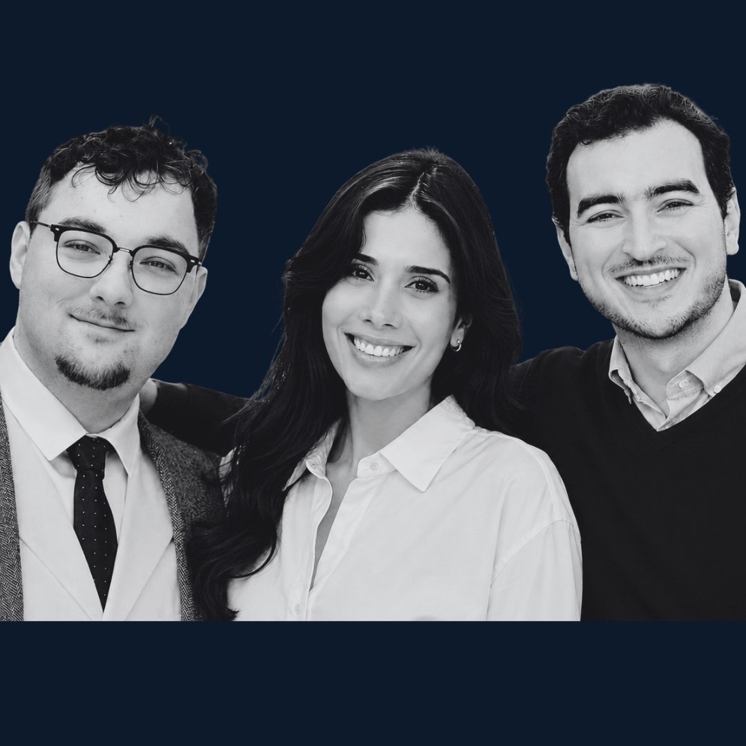 Three professional headshots of smiling people against a dark blue background in black and white